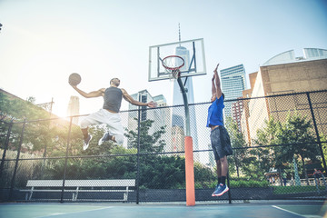 Fototapeta premium Basketball player playing outdoors