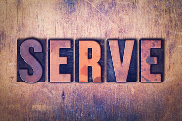 Serve Theme Letterpress Word on Wood Background