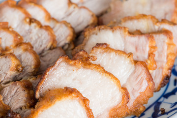 Deep Fried Crispy Pork Belly Cooked with Garlic and spicy dipping sauce