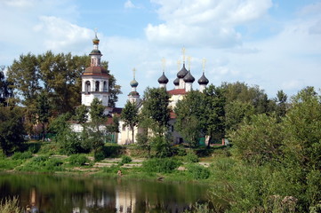 Fototapeta na wymiar Vologda, Russia. View on church of Dimitry Prilutsky on the bank river Vologda