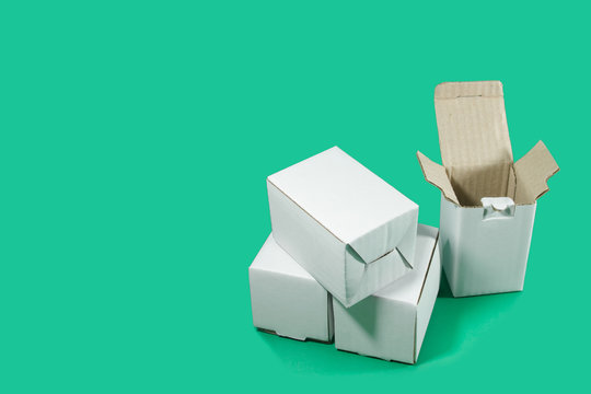 White boxes on green background. Shipping concept