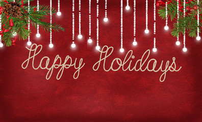 happy holidays greeting in rope text on red textured background with glowing string lights and pine bough © driftwood