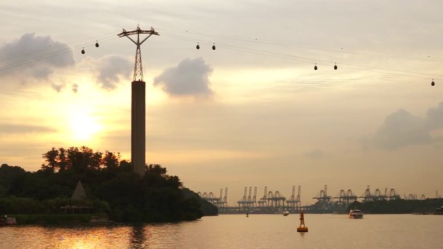Singapore. December 04, 2017: Beautiful landscape of sunset at Harbourfront Centre with Cable Car transportation in Singapore
