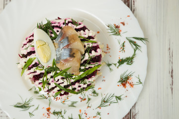beet salad with fish and egg