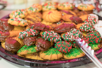 Holiday Party cookies decorated festively with chocolate and red, white and green sprinkles