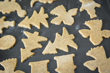 Cut dough on baking grease.
