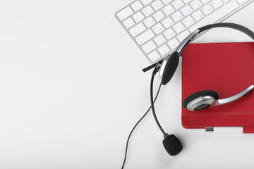 headset on keyboard computer laptop