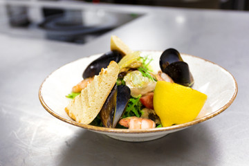 Prepared dish with mussels in shells