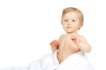 Caucasian baby covered with towel isolated on white background