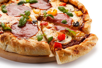 Pizza pepperoni with tomatoes, mushrooms and pepper 
