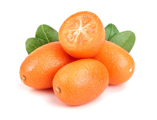 Cumquat or kumquat with leaf isolated on white background close up