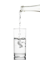 bottled water and a glass