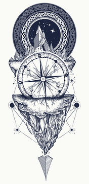 Mountains and antique compass tattoo art. Compass, arrows, mountains and night forest boho style, t-shirt design. Adventure, travel, outdoors, symbol