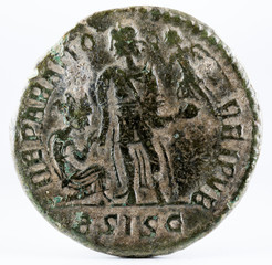 Ancient Roman copper coin of Emperor Valentinian II. Reverse.