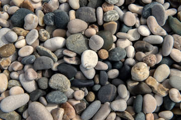 Beach stones background. Top view.