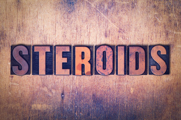 Steroids Theme Letterpress Word on Wood Background