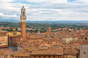 Fototapeta na wymiar Siena, View of the Old Town - Piazza del Campo, Palazzo Pubblico di Siena, Torre del Mangia. Tuscany, Italy.