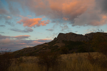 Fototapeta na wymiar beautiful sunset view of mountains of Karadag, Crimea