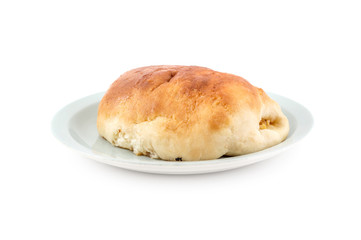 Saucer with sweet bun on white background.