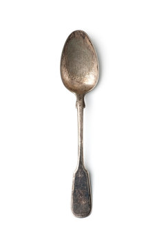An old shabby tablespoon in a classic style. Isolated on white background..