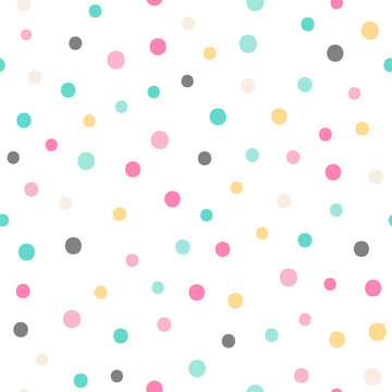 Vector seamless pattern with color dots. Cute background for baby. Pink, yellow, green, gray, beige elements on white backdrop.