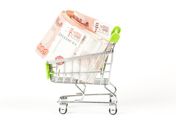 Food trolley, full of Russian 5000 banknotes. On a white background.