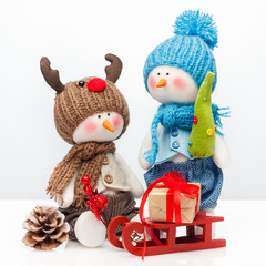Merry Christmas and Happy New year, winter concept. Snowmen and gift.