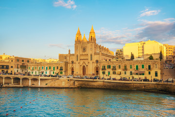 beautiful european view of Saint Julians church, Balluta Bay, Malta