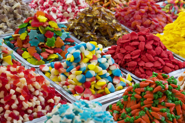 Assortment of jellied colored sweets as a product background