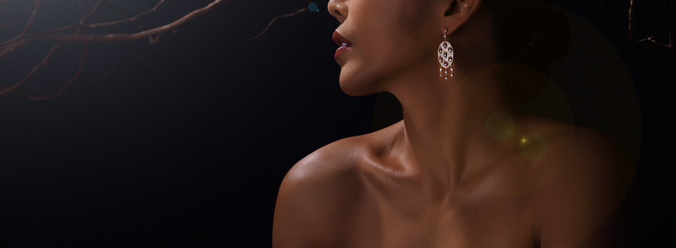 Beautiful Woman with Diamond earrings for Christmas Holiday Gift