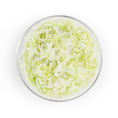 food top view, cabbage chopped in glass bowl isolated on white background