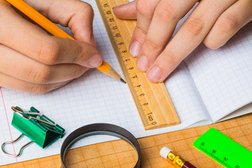 draftsman draws on a ruler