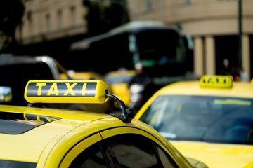 yellow taxi with with the logo