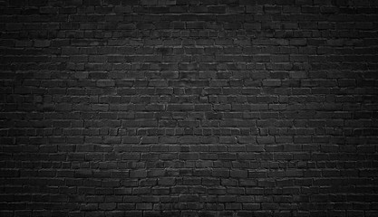 black brick wall background. texture dark masonry