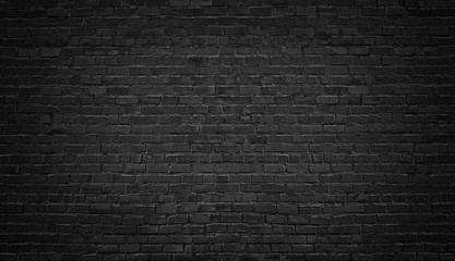 black brick wall background. texture dark masonry