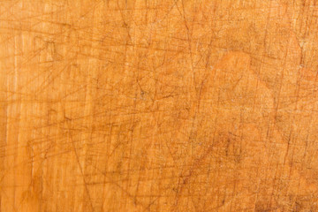 wood texture, surface of a cutting board made of beech has many scratches