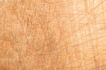 wood texture, surface of a cutting board made of beech has many scratches