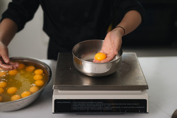 Bakery chef cooking bake in the kitchen professional