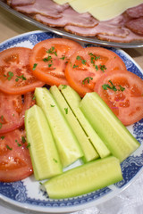 salad made of tomatoes and cucumbers served  on plate for aperitive