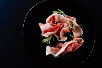 Prosciutto with rosemary.
