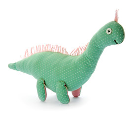 Cute toy dinosaur on white background