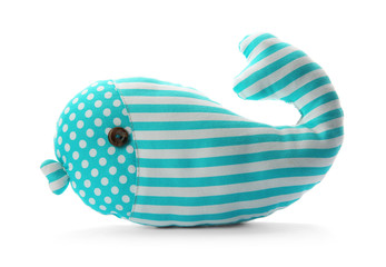 Cute toy whale on white background