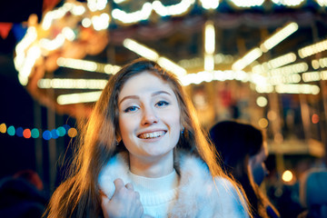 Fototapeta na wymiar red-haired girl in christmas, outdoor
