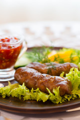 sausage grilled with herbs and sauce