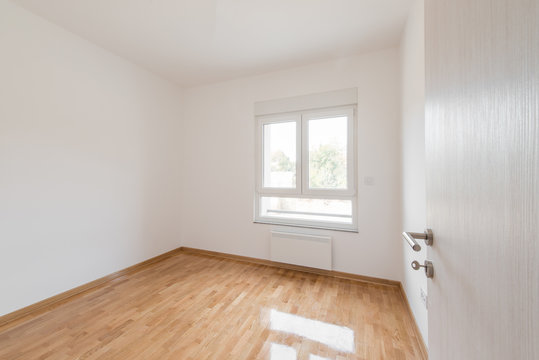Room with window in empty apartment
