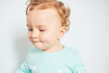 Naklejka premium Portrait of a child emotion on a clean background
