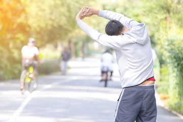 Fitness sport young man running in the park.Healthy concept