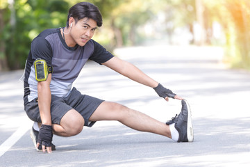 Fitness sport young man running in the park.Healthy concept