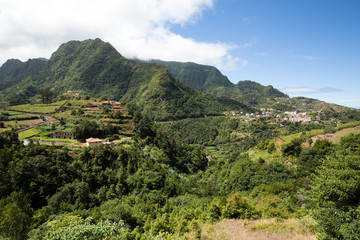Obraz premium Village and Terrace cultivation in the surroundings of Sao Vicente. North coast of Madeira Island, Portugal