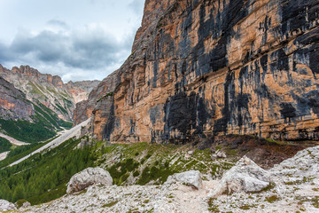 Vertical and majestic western side of Tofana di Rozes Peak with Travenanzes Valley background, Dolomites, Italy